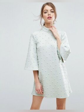Pearl Shift Mini With Fluted Sleeve
Dress